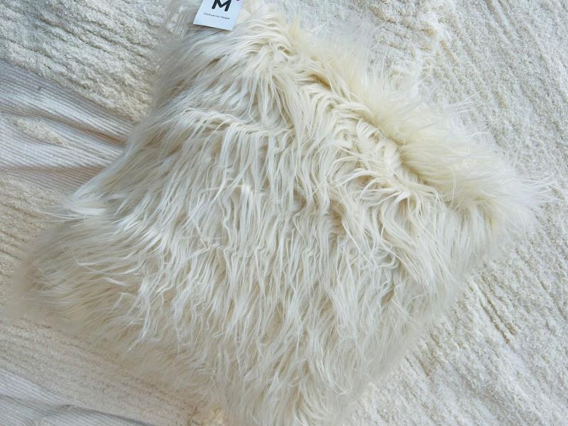 ALMOHADON 50*50 PELO LARGO